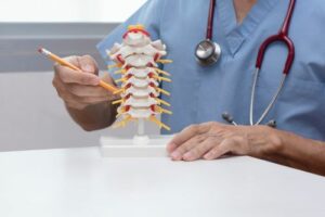 Doctor Explaining Disc Replacement in Neck