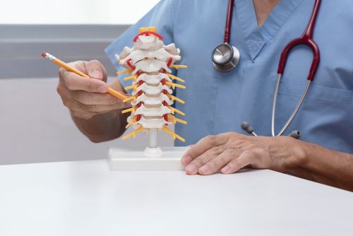 Doctor Explaining Disc Replacement in Neck