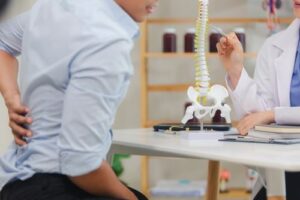 Doctor Explaining Intracept Procedure for Back Pain