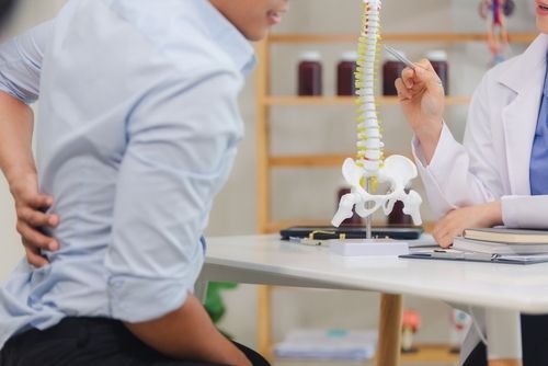 Doctor Explaining Intracept Procedure for Back Pain