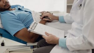 Car accident doctor discussing car accident-related-treatment plan
