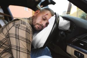 Unconscious driver with traumatic brain injury after a car accident
