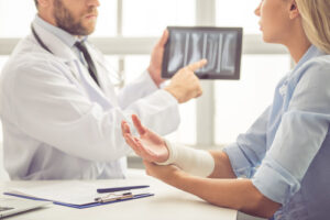 Patient Consulting With Orthopedic Specialist