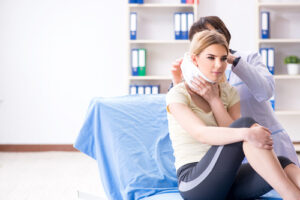 Doctor and Patient at Car Accident Clinic